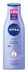 LAIT CORPS DOUCEUR HYDRATATION INTENSE AU BEURRE DE KARITE POUR PEAUX SECHES 250ML NIVEA